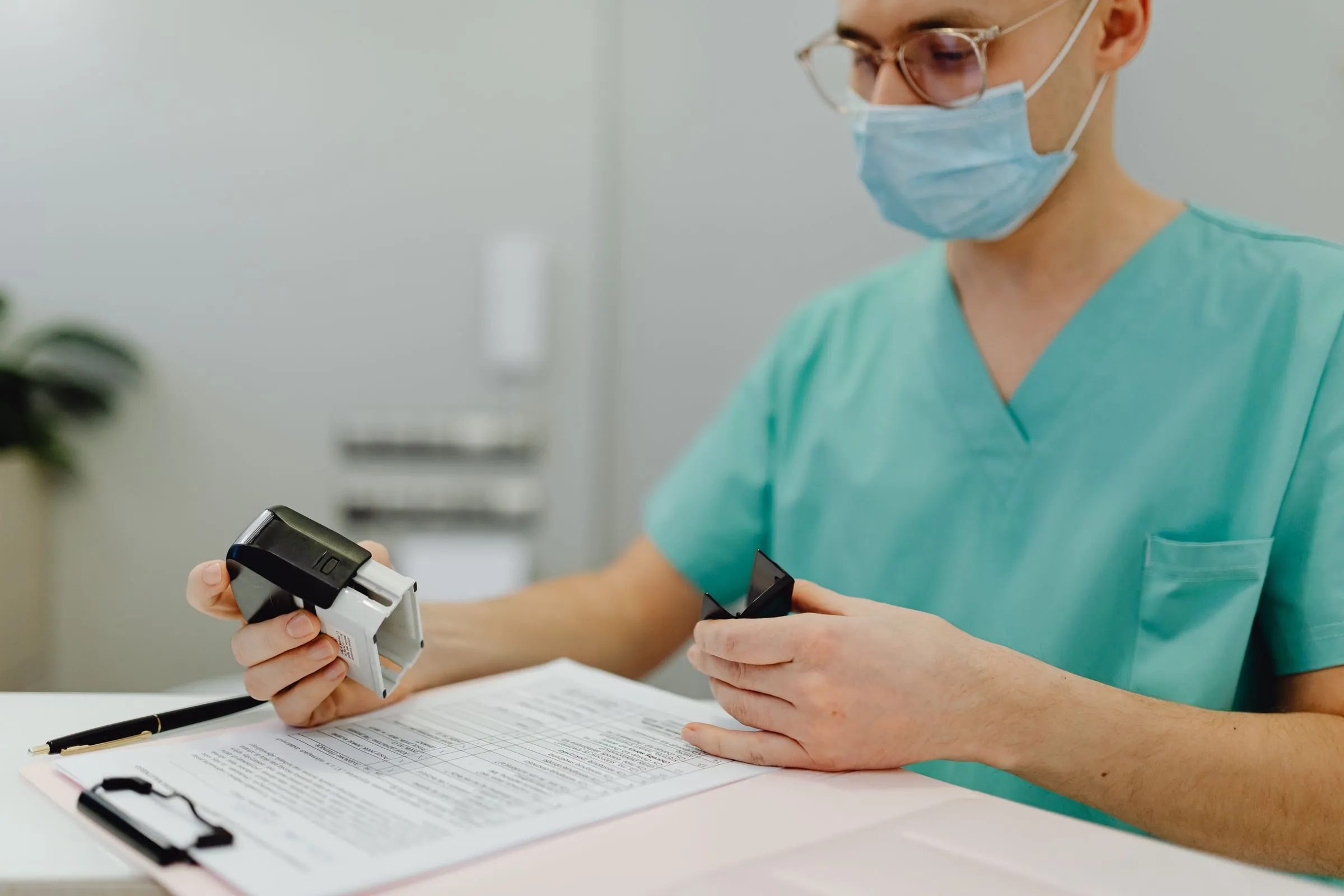 A healthcare worker reviewing patient files